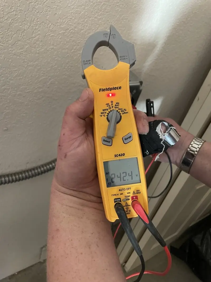 Voltage testing with clamp meter during Generator Installation in Hudson